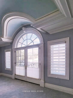 Living Room with Arched Windows and Pirouette Blinds in Alpine, NJ:  Alt text: 